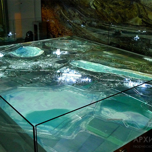 Interactive model of mining and processing complex with interactive video projection system and audio background