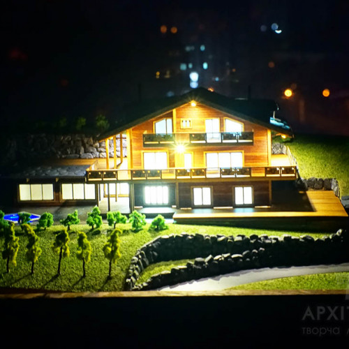 Architectural model of a cottage made of wood