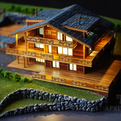 Architectural model of a cottage made of wood