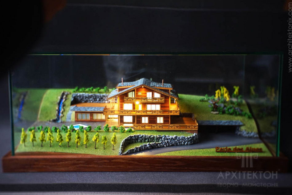 Architectural model of a cottage made of wood